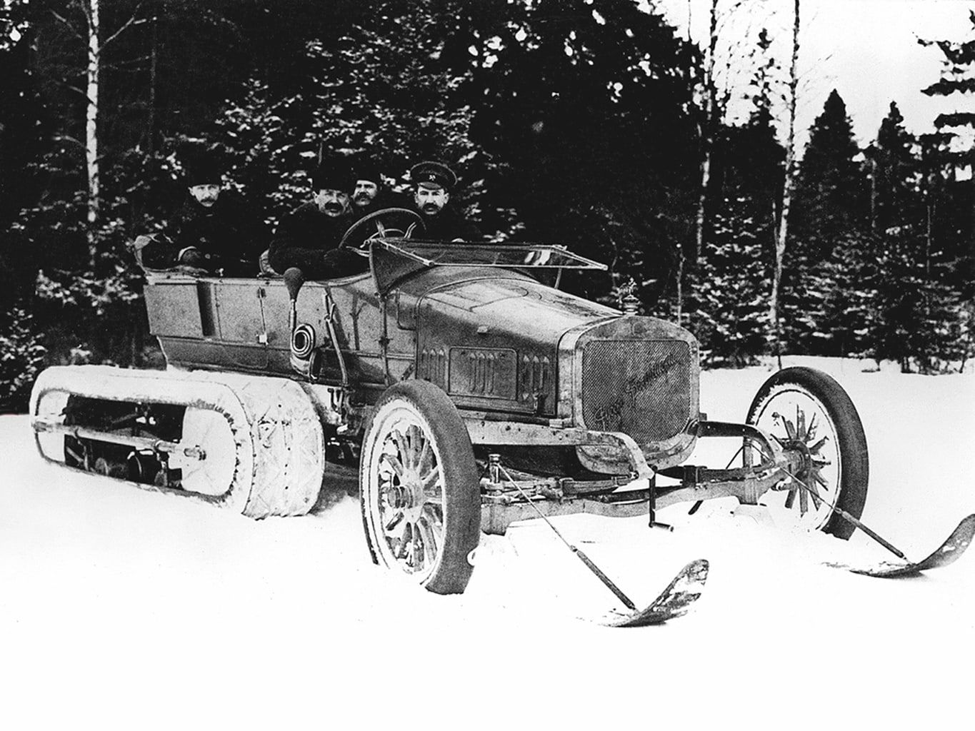 A Russo-Balt fitted with Kégresse half-track rubber tracks and front skis in snow, archive photograph