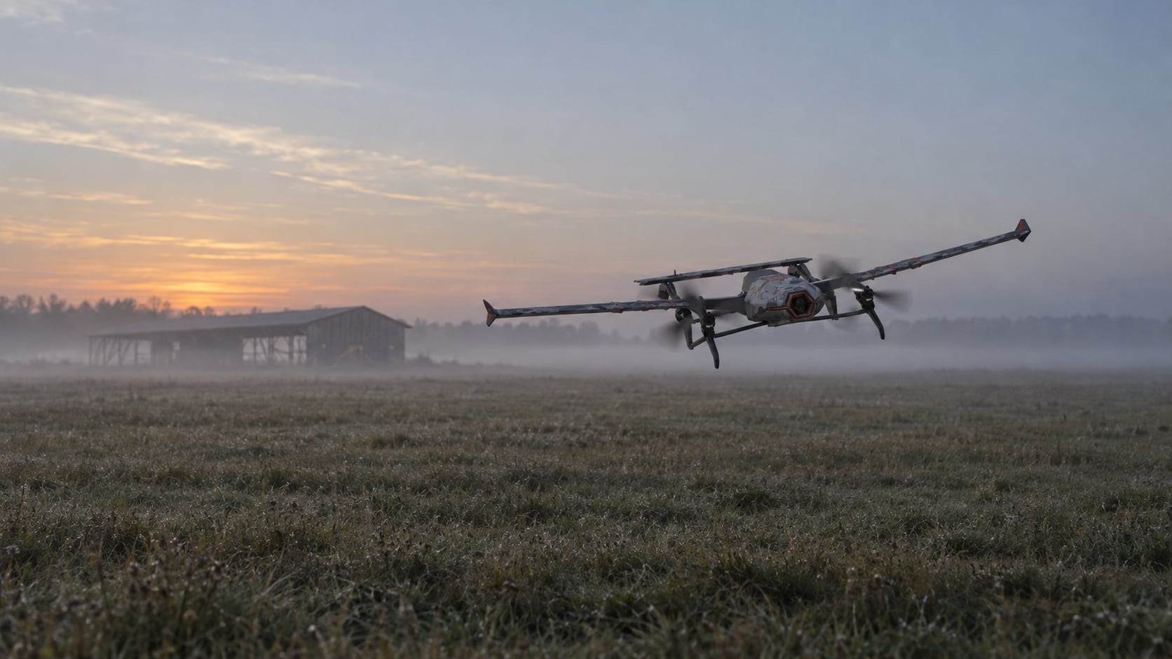 The DARTZ PromDrone Black Bee in flight over a misty field at dawn