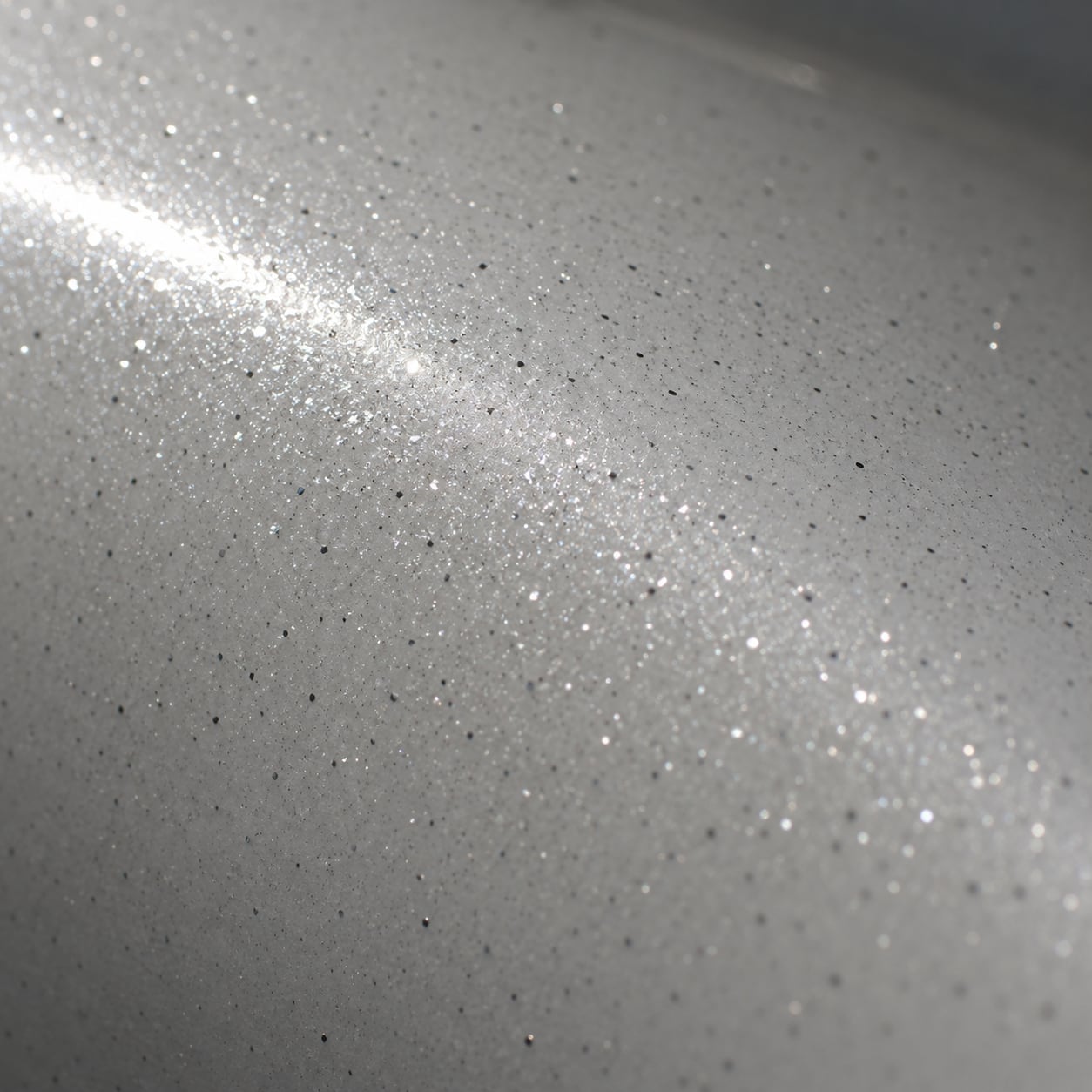 Close-up of the black paint of the DARTZ Black Alligator, lacquered with 1,001 black diamonds