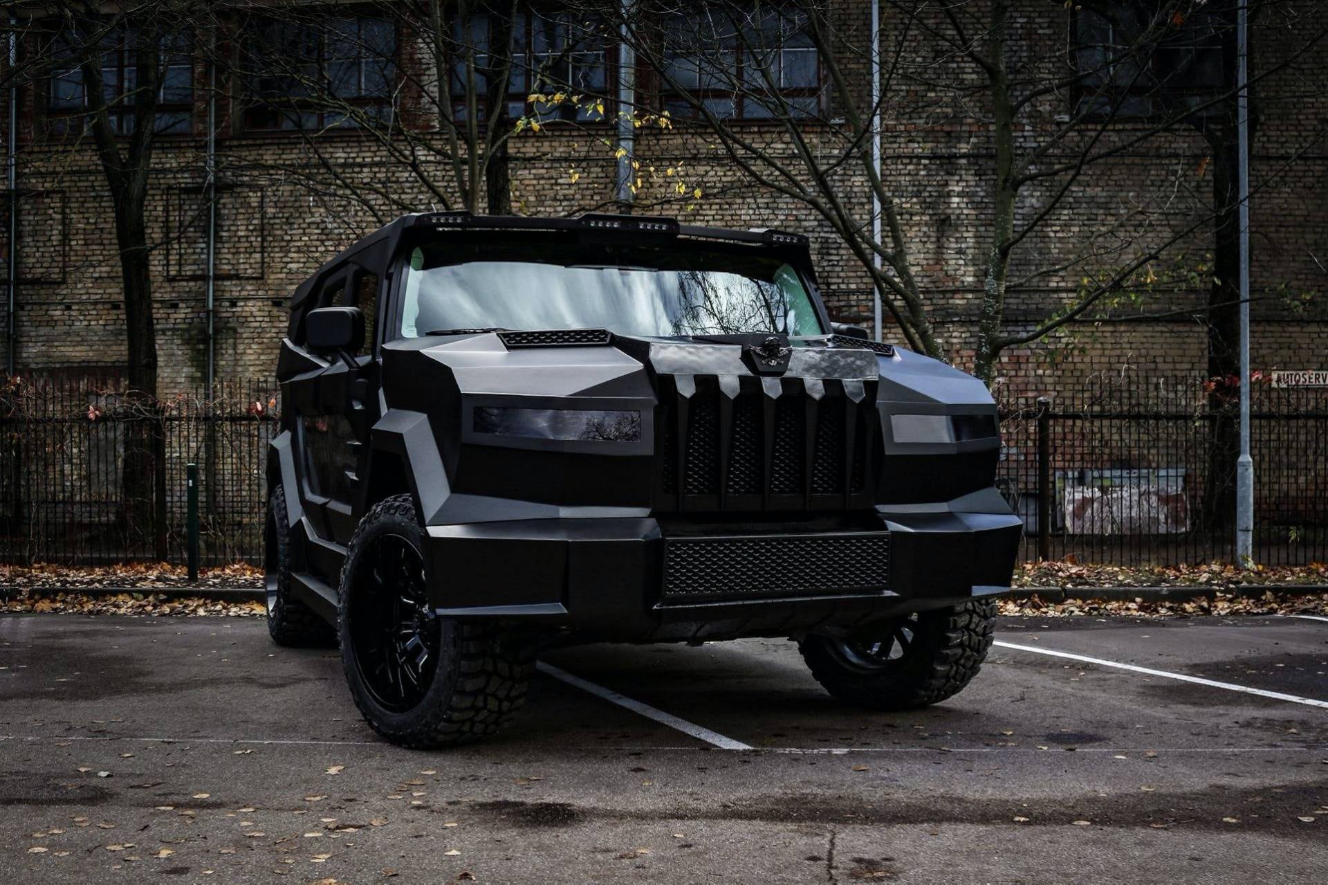 DARTZ Prombron’ Black Stallion, front three-quarter, in a Riga courtyard