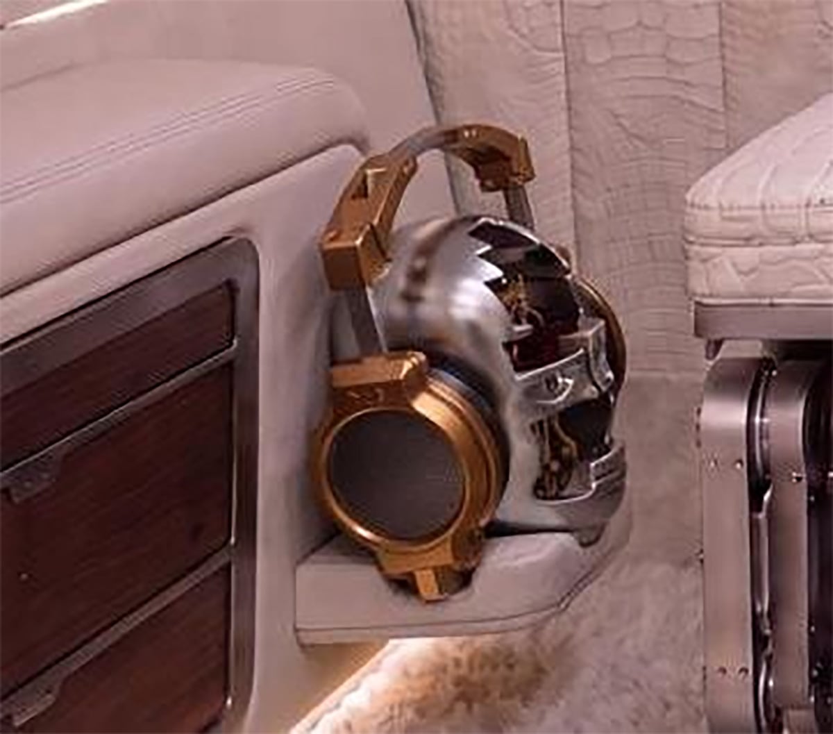 A sculpted headphone holder set into the cabin trim
