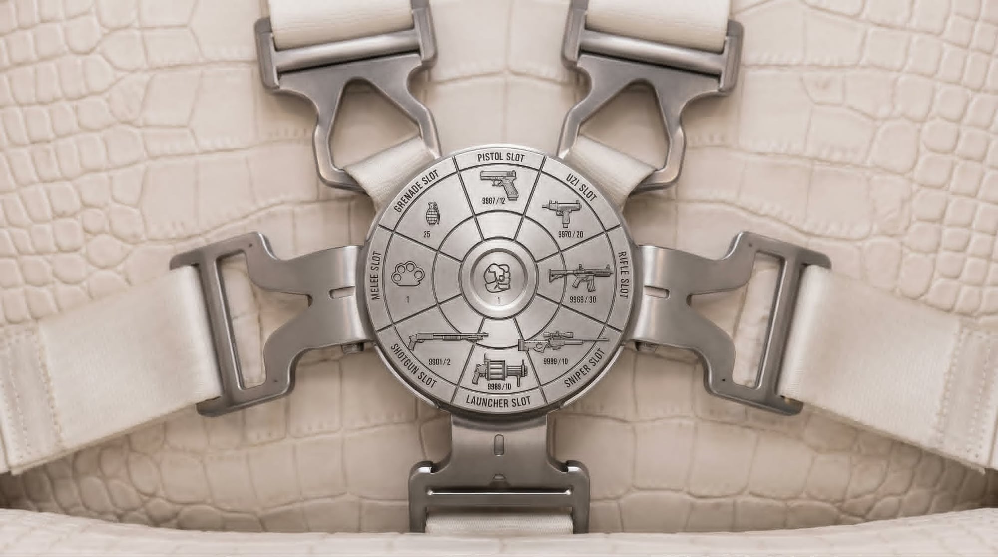 The engraved metal seatbelt buckle shaped like the game’s weapon wheel, on alligator-textured leather