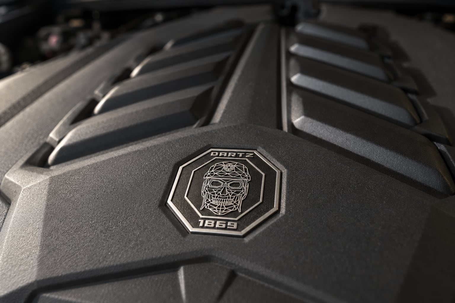 The twin-turbo V8 of the Iron Diamond CLV, with the DARTZ skull crest on its engine cover